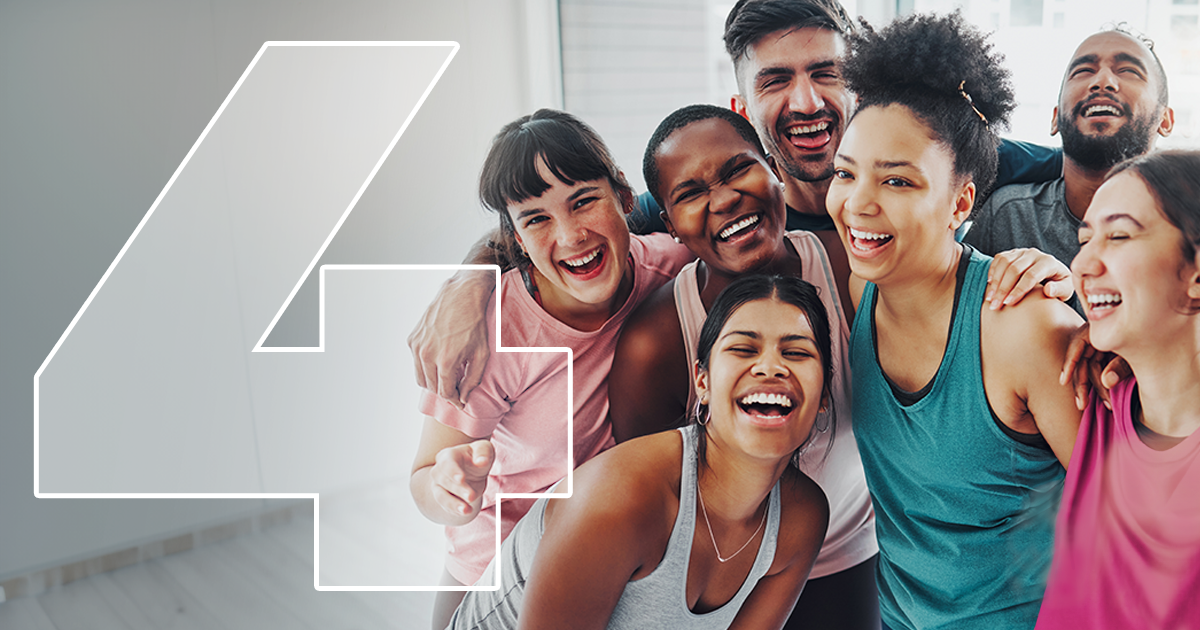 friends celebrating during workout in gym
