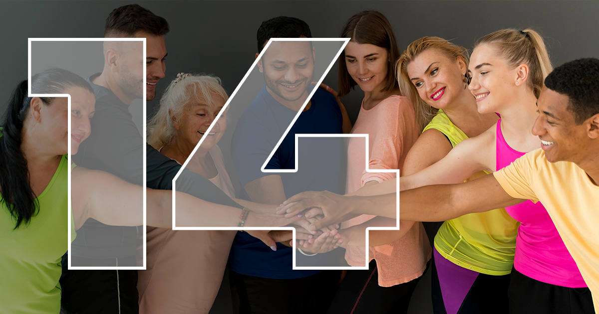 group of people hands in huddle