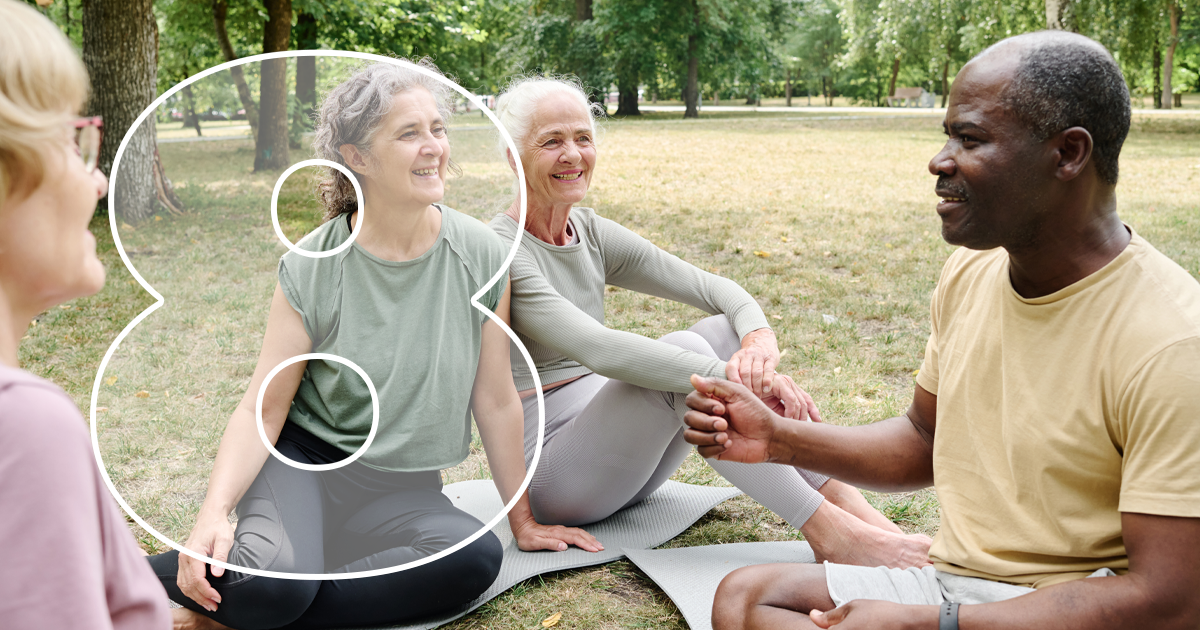 group of friends meditating outside