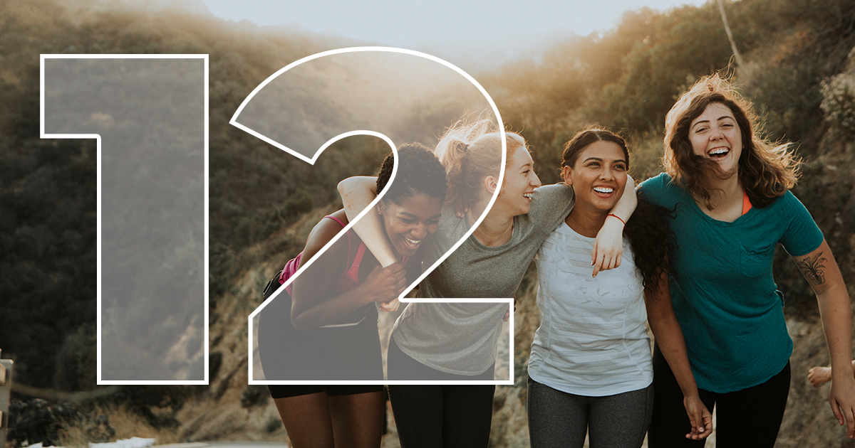 group of people outside laughing